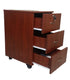 Mahogany mobile office pedestal with 3 drawers, top middle lock, and four wheels underneath.